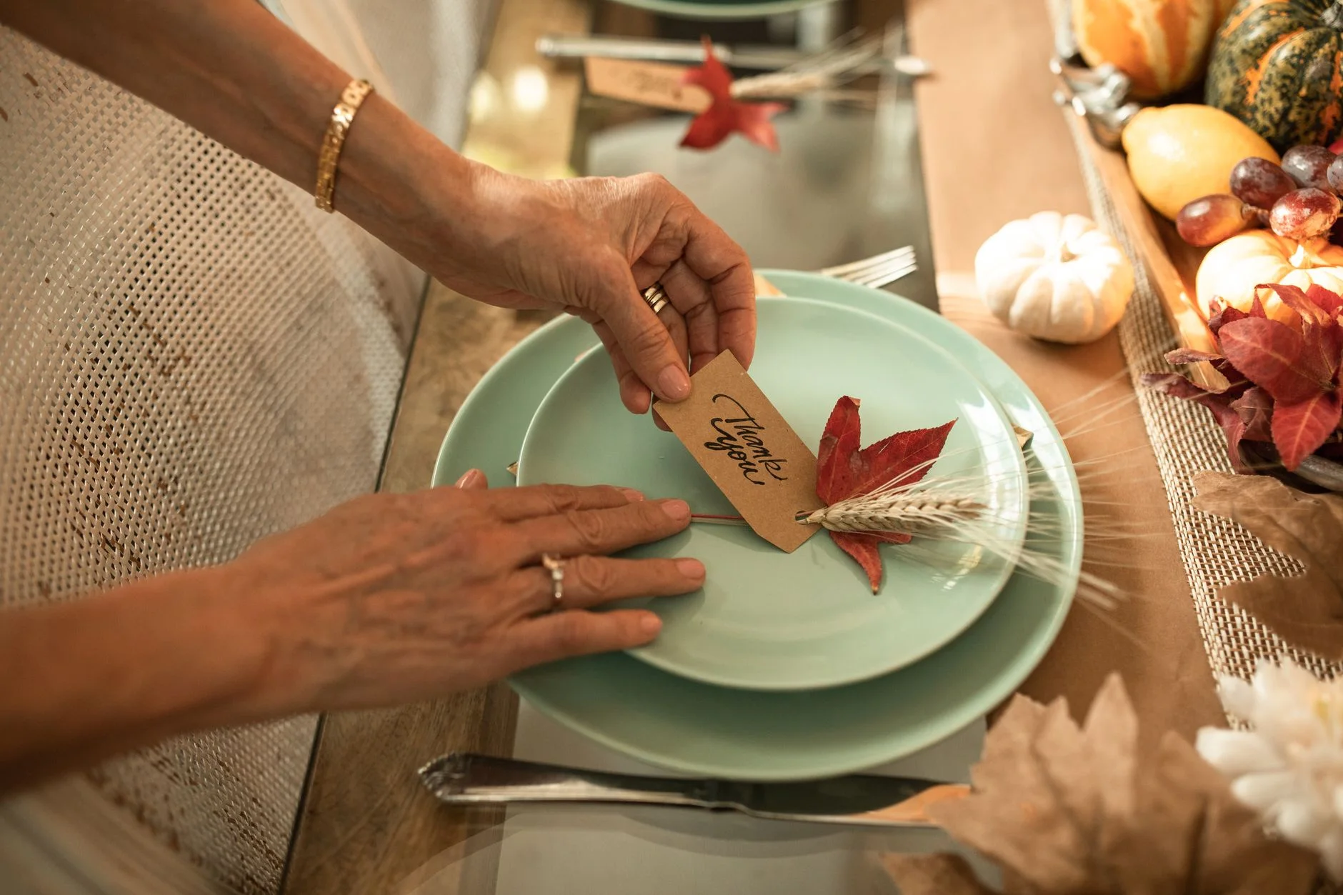 thanksgiving prep — Beautiful autumn-themed table setting with a 'Thank You' card, perfect for Thanksgiving celebrations.